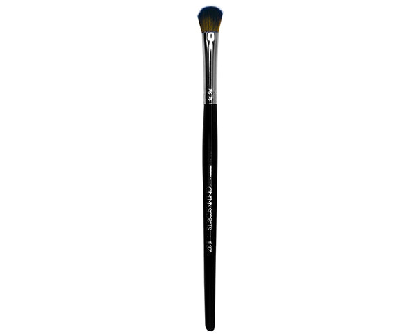 makeup brush with black handle on white background