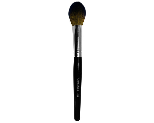 Close up of makeup brush with black handle on white background