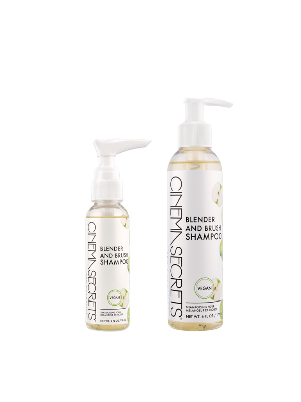 Two bottles of Cinema Secrets Blender and Brush Shampoo on a white background