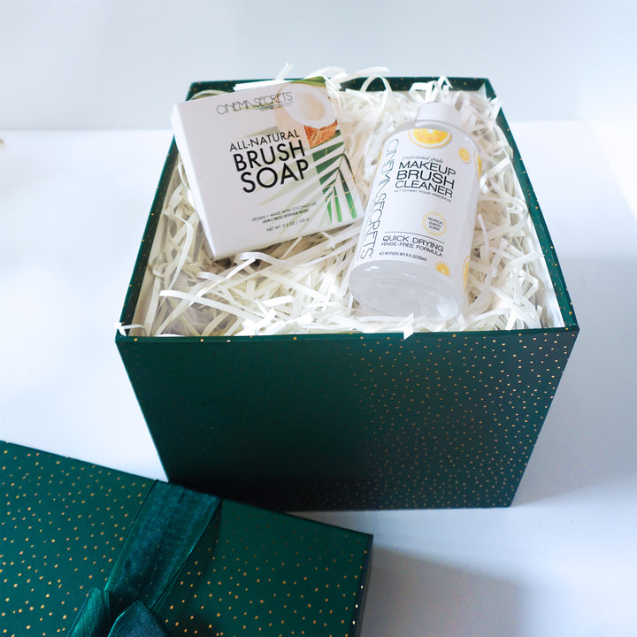 Green gift box with 'All Natural Brush Soap' and 'Makeup Brush Cleaner' on a white background