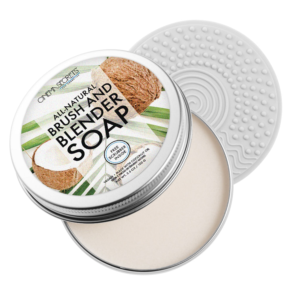 open tin of soap with silicone scrubber on white background