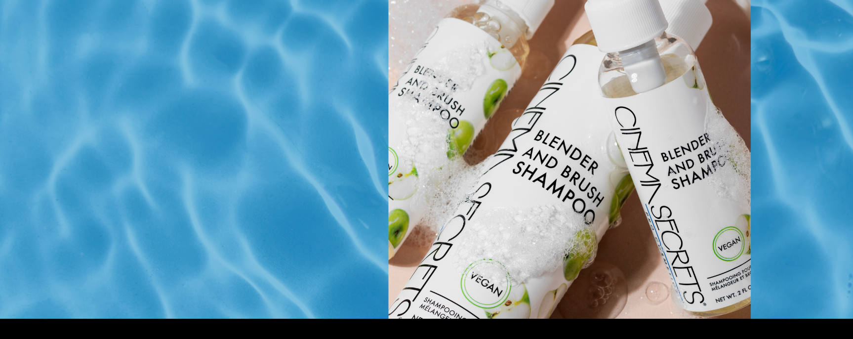 Two bottles of 'Cinema Secrets' Blender and Brush Shampoo held by a person against a pool background.