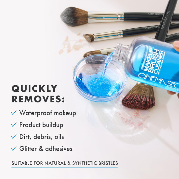 Makeup brush cleaner being used with brushes on a white background