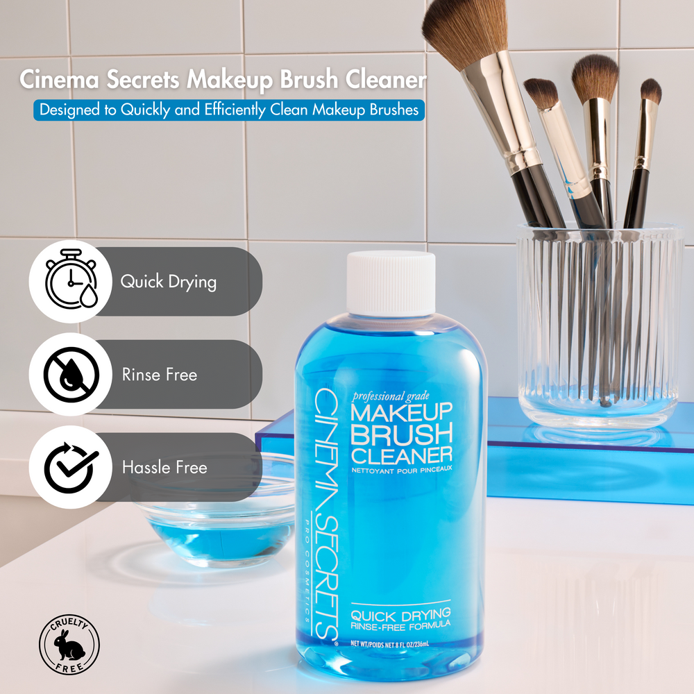 Blue brush cleaner centered on counter with glass holding makeup brushes on a blue riser with small bowl of blue brush cleaner behind bottle. Product calls ours to the left. Quick drying, rinse free, hassle free 