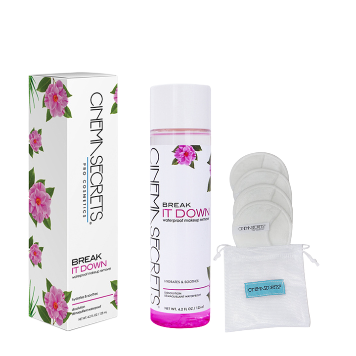 box on left bottle with white label in middle and reusable makeup remover pads to the right
