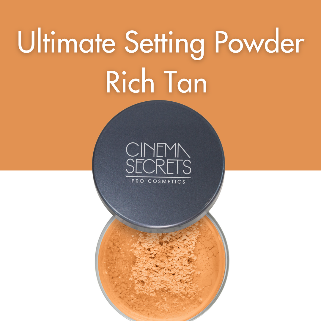 open compact of face powder on whte background